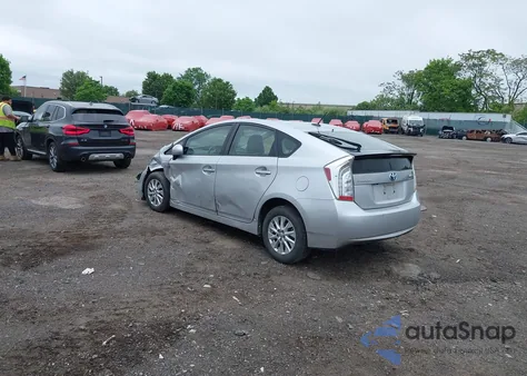 2014 Toyota Prius Plug-In from USA, damaged, VIN JTDKN3DP1E3050561